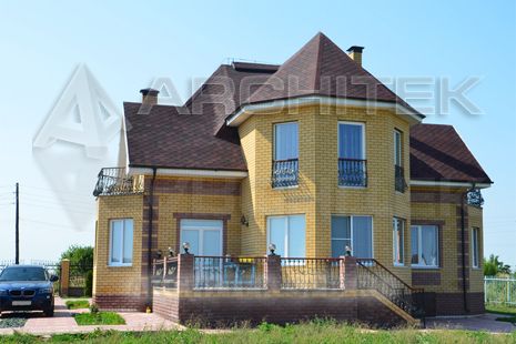 T-016-K Проект дома из кирпича с мансардным этажом, эркером, балконом, террасой